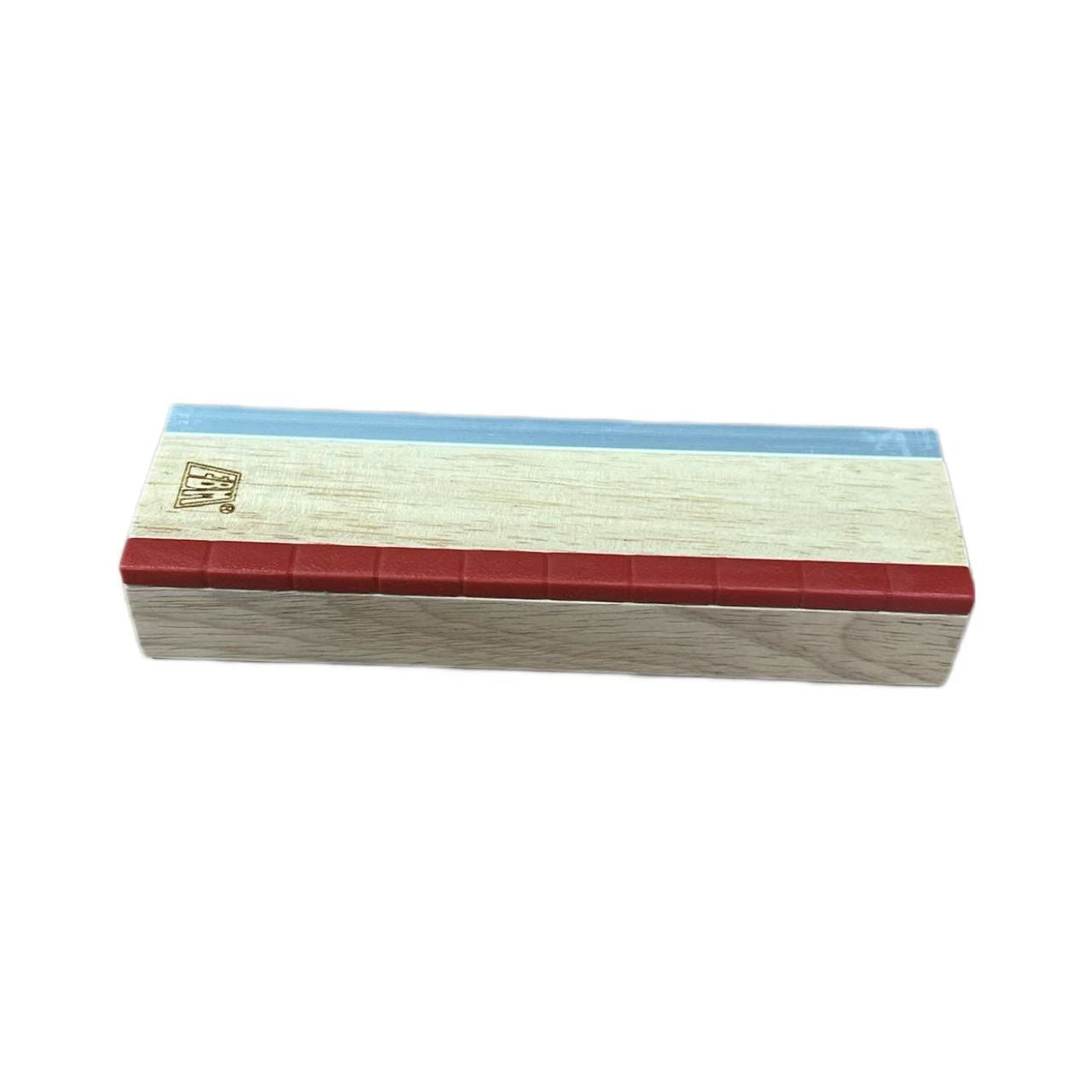Wooden fingerboard skate park setup with obstacle